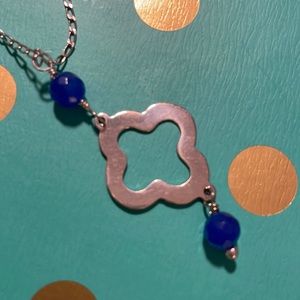 BNWT Sterling Silver Clover necklace with two blue beads.